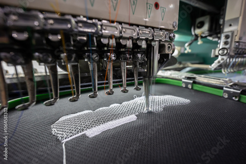 Embroidery student school name tag in Textile Industry at Garment Manufacturers Kota Kinabalu, Sabah, Malaysia.(selective focus and soft focus)