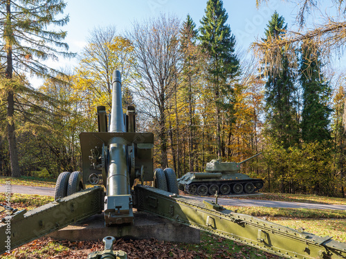 Historic tank and cannon from the Second World War on display in front of the observation tower in Vyšný Komárnik. photo