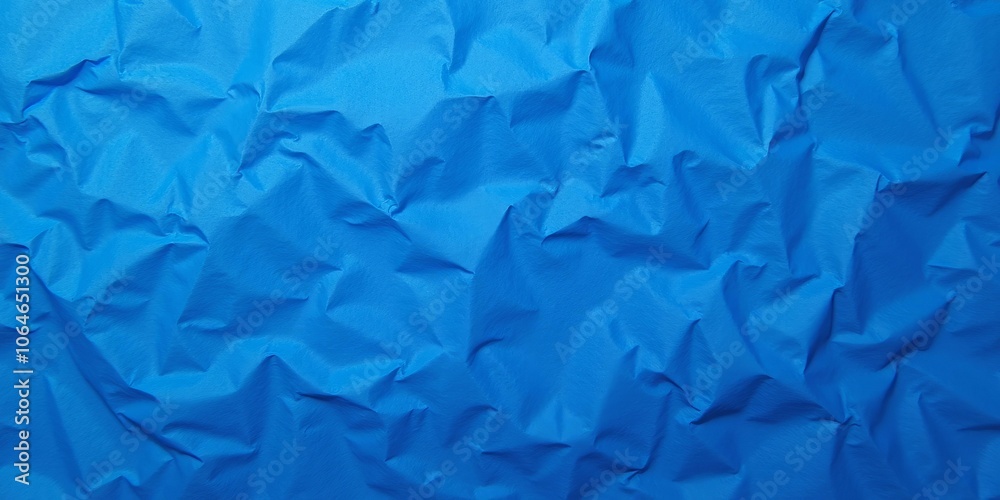Obraz premium Crinkled Paper Texture Background In Sapphire Color