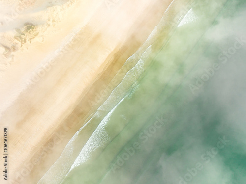 Aerial view of the golden beach and waves. photo