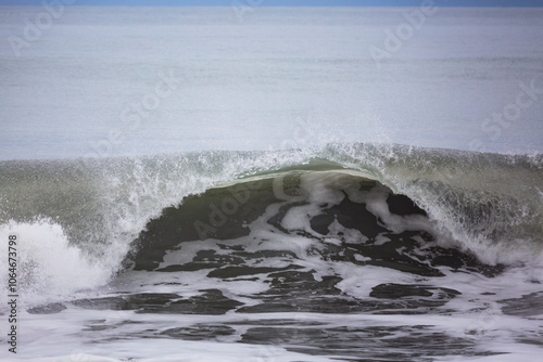 Ocean waves breaking on beach, Olympic Peninsula, Washington State. photo