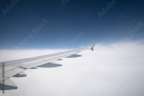 The airplane flew over the clouds.	 photo