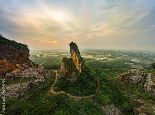 Small green mountains with sunset