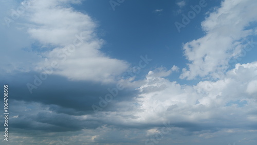 Beautiful dark dramatic sky with stormy clouds before rain or snow. Thunderstorm heaven landscape. Timelapse.