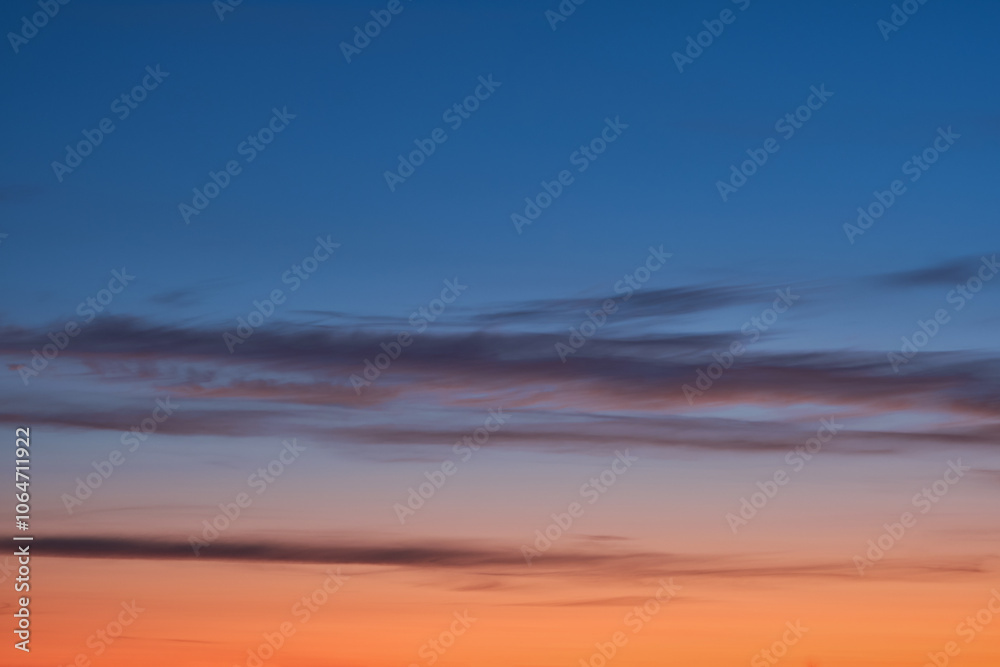 Beautiful sunset and sunrise. Dark moody blue and orange sunset sky. Natural background. Simple background sky for poster or mock up. Soft focus. Beautiful sunset and sunrise. Dark moody blue and orange sunset sky. Natural background. Simple background sky for poster or mock up. Soft focus.