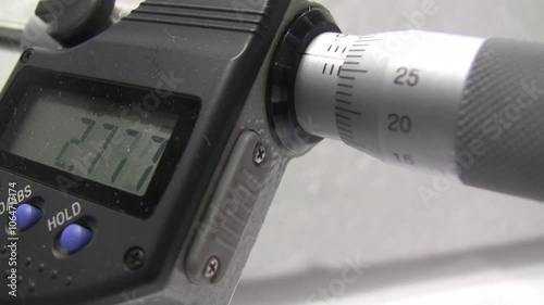 Measuring micrometer. Industrial measuring tool. Micrometers Mitutoyo. Wire measurement