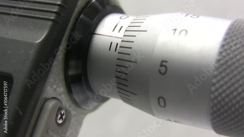 Measuring micrometer. Industrial measuring tool. Micrometers Mitutoyo. Wire measurement