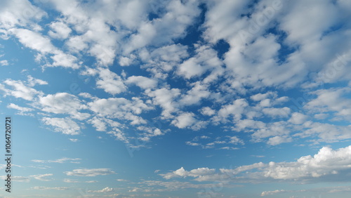 Cirrocumulus and cumulus on different layers cloudscape moved. Clearing day and good windy weather. Timelapse. photo