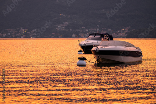 Boats on Lake Como on sunset , Italy