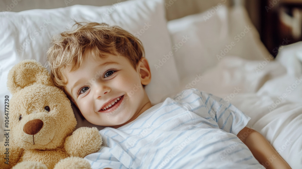 A cheerful child cuddles a teddy bear while lying on a bed, smiling broadly. The cozy bedroom is softly lit, creating a warm atmosphere A cheerful child cuddles a teddy bear while lying on a bed, smiling broadly. The cozy bedroom is softly lit, creating a warm atmosphere