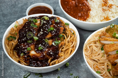 Teriyaki Grilled Chicken Noodles, Katsu Chicken Noodle, Butter Chicken with Rice served in bowl isolated on grey background side view of assorted japanese food verity assortment photo