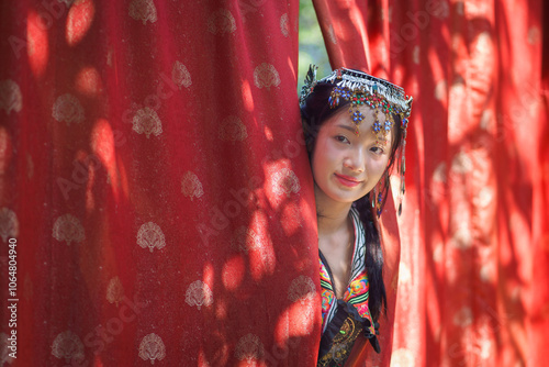 Portrait Fashion of the Asian Tourist young girl wearing traditional Tibetan clothing costume during the Nepal.  Tibetan woman dress concept. Tibetans an East Asian ethnic group native. photo