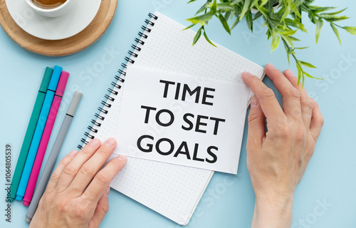 time to set goals text on white paper text written photo