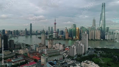 Aerial drone view of Shanghai city center in China,Asia. Huangpu River in Shanghai frome drone. Huangpu River, Huangxiepu or Chunshen River the landmark of Shanghai, Pudong and Puxi. photo