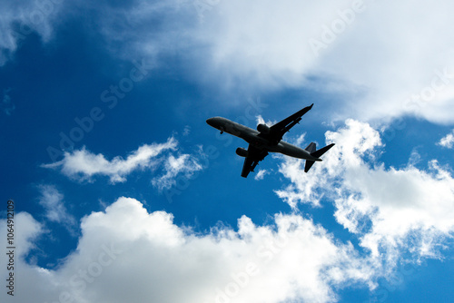 A Large Passenger Aircraft Passing Overhead