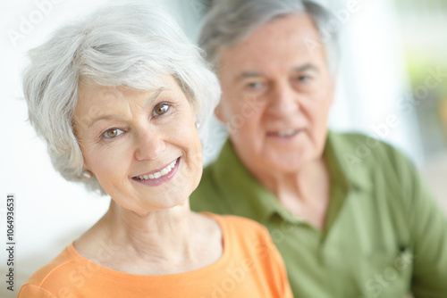 Senior couple, relax and portrait with love in home for retirement, connection and romantic bonding. Elderly woman, man and face with smile in house for peace, marriage or support on weekend together