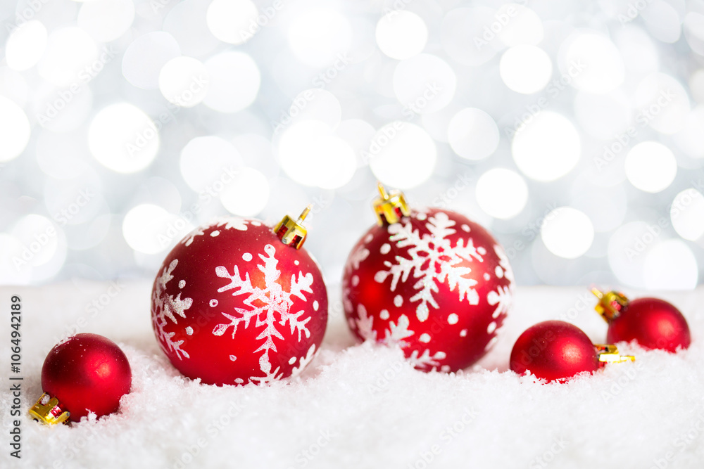 Christmas and New Year background. Red Christmas Baubles on white defocused background