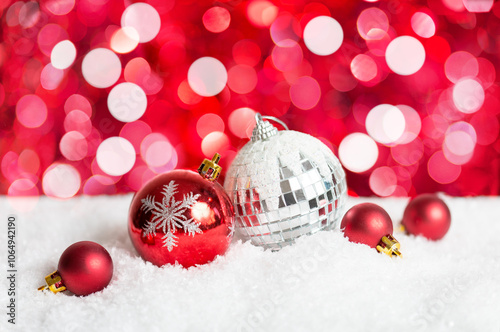Christmas and New Year background. Christmas Baubles on  red defocused background