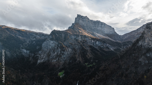 Landscape of mountains covered by trees with autumn colors during a clear day