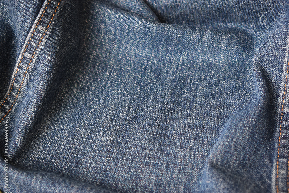 Fototapeta premium seam of blue denim texture background, jean fashion style