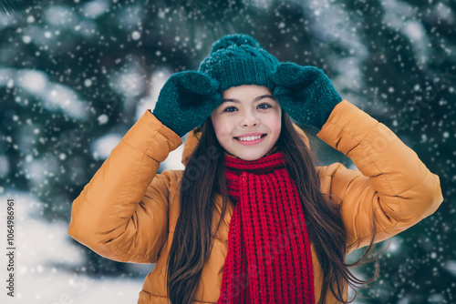 Fotografie Portrait of attractive cheerful pre-teen girl wearing warm outfit spending free
