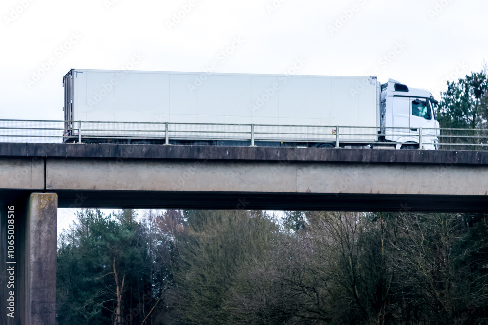 Obraz premium Heavy Goods Vehicles Are Used For A Variety Of Used Often Used To Deliver Goods To Their Customer(s)