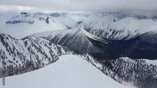 Snowfall on Distant Mountain Slope, Snow Falling on Mountain Slope in Winter
