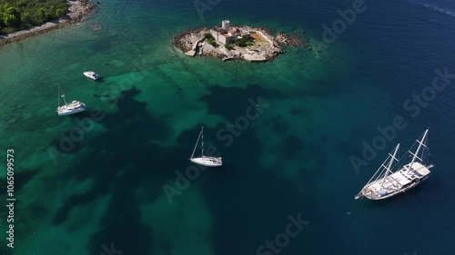 Aerial view of of Otocic Gospa island with an Orthodox church, Kotor Bay, Montenegro photo