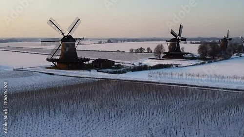 Snowy Farmland with Windmills in Winter, Snow-Covered Fields with Windmills
