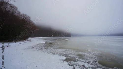 Frozen Lake with Light Snow and Hovering Fog, Winter Lake with Snowfall and Mist