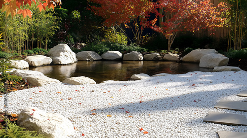 Japanese zen garden with rocks, pond, and autumn trees creating a serene and tranquil wellness atmosphere