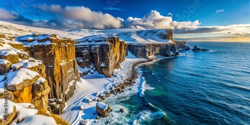 Captivating Winter Scene of Latrabjarg Cliffs in Iceland's West Fjords - Snow-Covered Landscape Photography photo