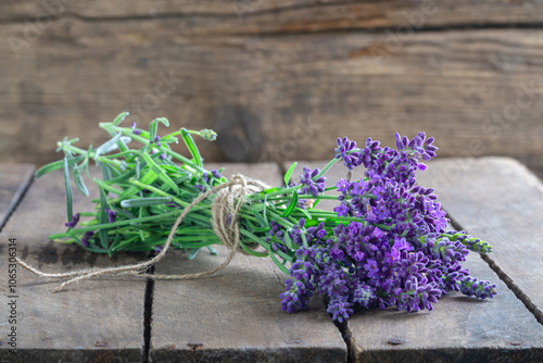 Bouquet of lavender flowers on old wood