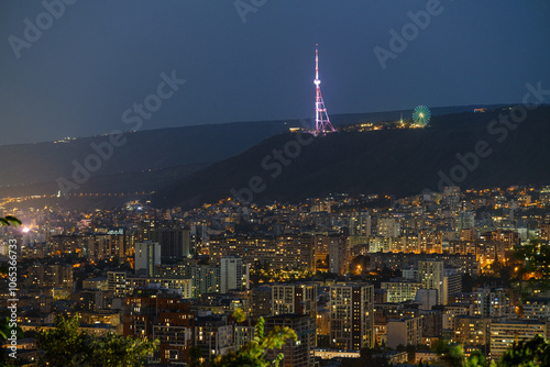 Tbilisi, Georgia - October 20 2024: Cityscape of Tbilisi under Mount Mtatsminda photo