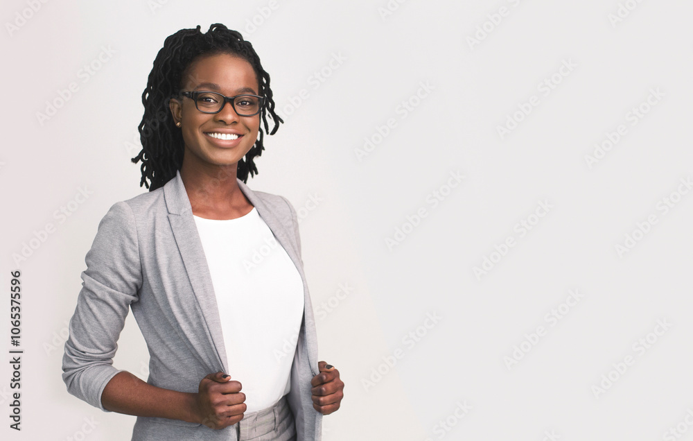 © Prostock-studio - Successful Entrepreneurship. Happy Afro Business Girl Smiling At Camera Over White Background. Isolated, Empty Space For Text © Prostock-studio - Successful Entrepreneurship. Happy Afro Business Girl Smiling At Camera Over White Background. Isolated, Empty Space For Text