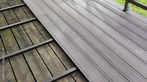 Billede på lærred Outdoor plastic composite brown floor. Renovation terrace