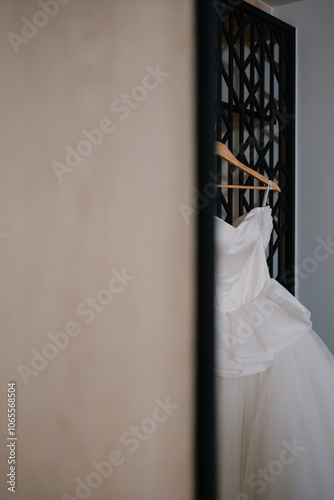 Wedding dresses for the bride and groom in the dressing room