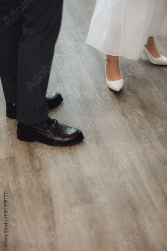 Close-up photo of the bride and groom's feet at their wedding.