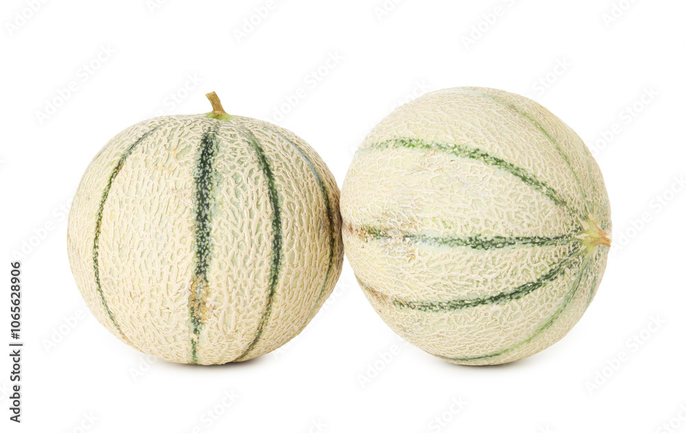 Fototapeta premium Two whole Cantaloupe melons isolated on white