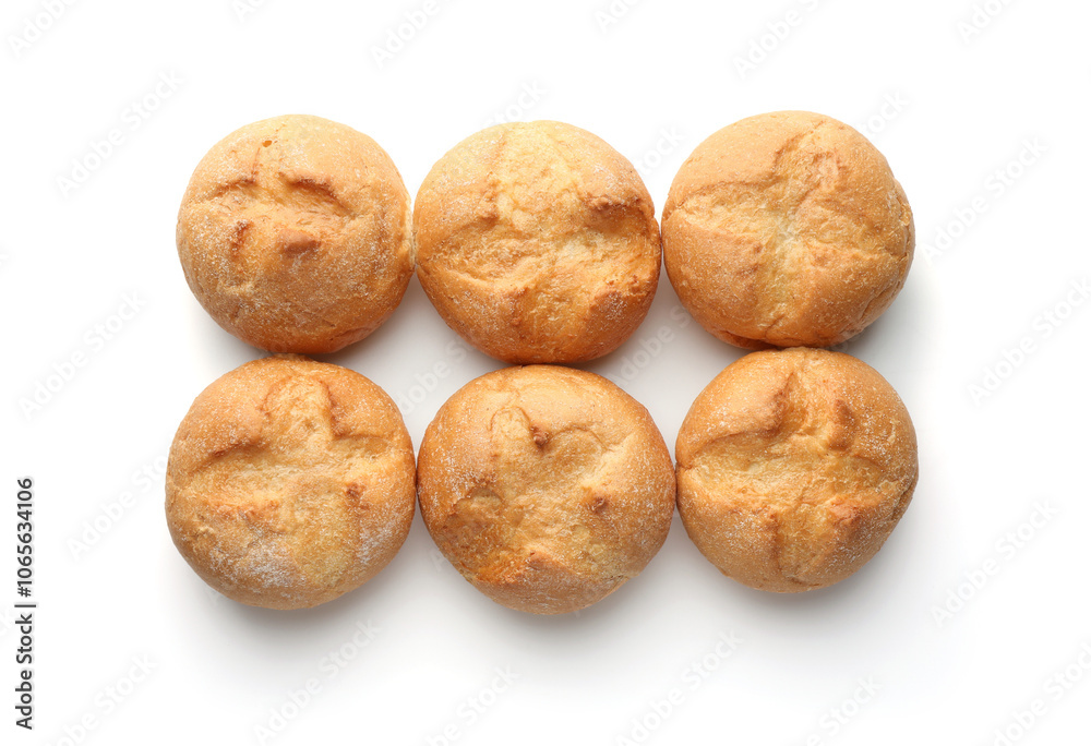 Fototapeta premium Homemade tasty buns isolated on white, top view
