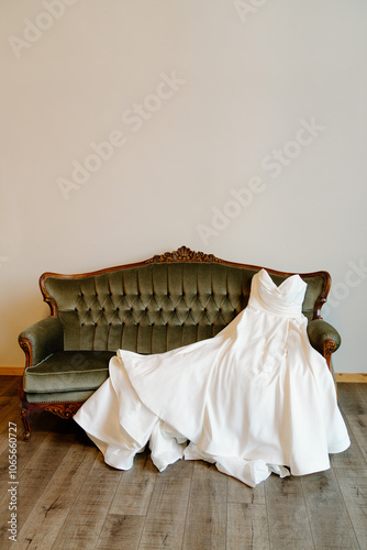 Elegant Wedding Dress on Velvet Sofa