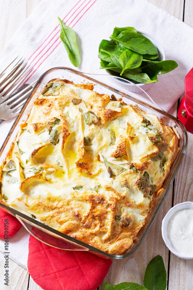 Traditional Bulgarian or Balkan pie banitsa made from filo dough, cream cheese and spinach.