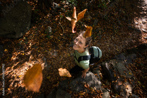 A young woman on an autumn hike in the forest