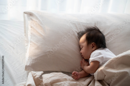 Peaceful Baby Sleeping on Pillow in Soft Morning Light