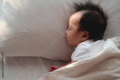 Peaceful Baby Sleeping on Pillow in Soft Morning Light