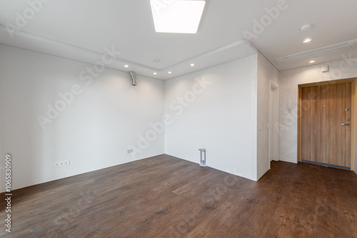 Empty Home Kitchen Interior. White Walls Room. Interior Empty Room with White Walls and Wooden Floor.