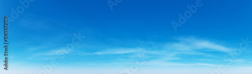 Blue Sky background with tiny Clouds. Panorama background