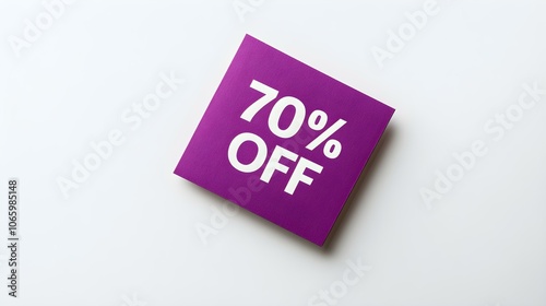 White '70% OFF' Text on a Purple Square Paper Note. White Background with Copy Space