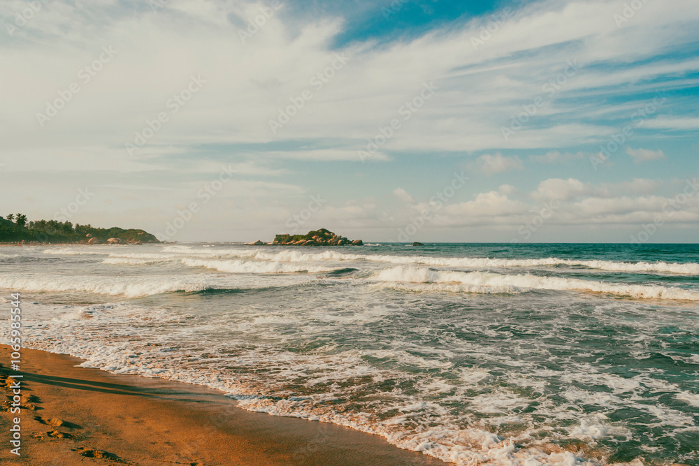 Beautiful landscape with ocean view and blue sky on the beaches of Tayrona Park. Santa Marta, Colombia. Beautiful landscape with ocean view and blue sky on the beaches of Tayrona Park. Santa Marta, Colombia.