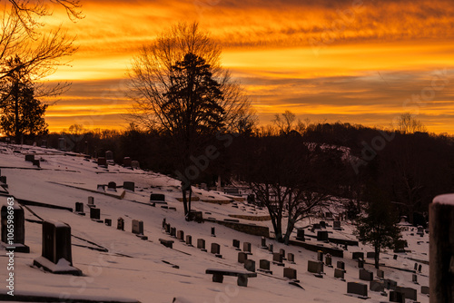 Obraz na płótnie Sunset Serenity at Snowy Cemetery w salonie